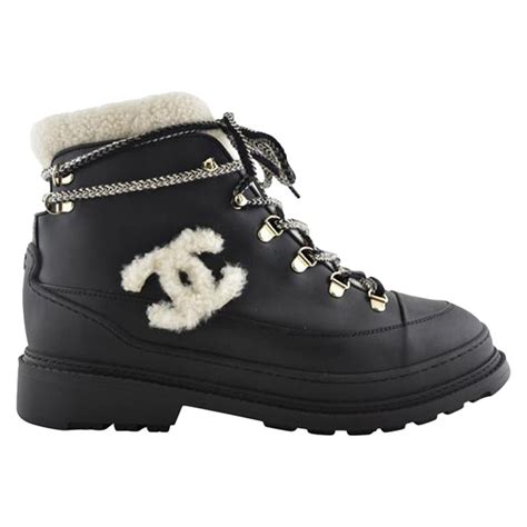 chanel snow boots white|Chanel shearling lined winter boots.